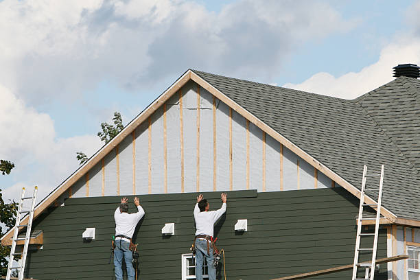 Professional Siding Replacement technician working in Greensboro, MD